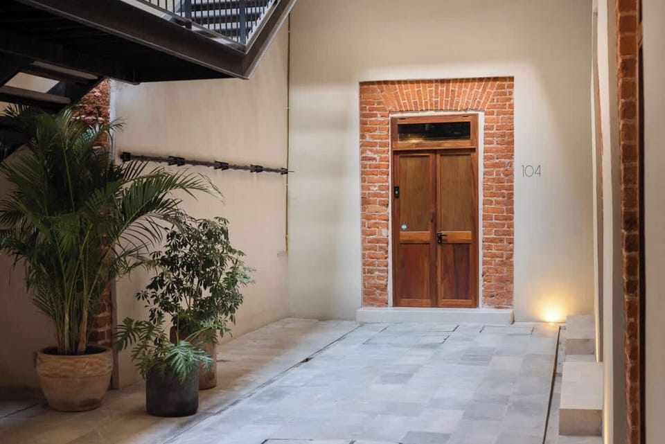 Our apartment's entrance ensures your safety with a Ring camera, and eliminates the hassle of carrying keys with an automatic code system.
