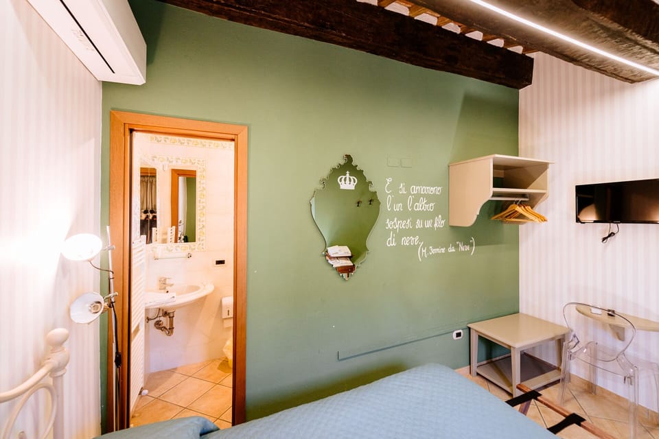 Classic Room, 1 Bedroom, Air conditioning, City View | Desk, laptop workspace, free WiFi, bed sheets