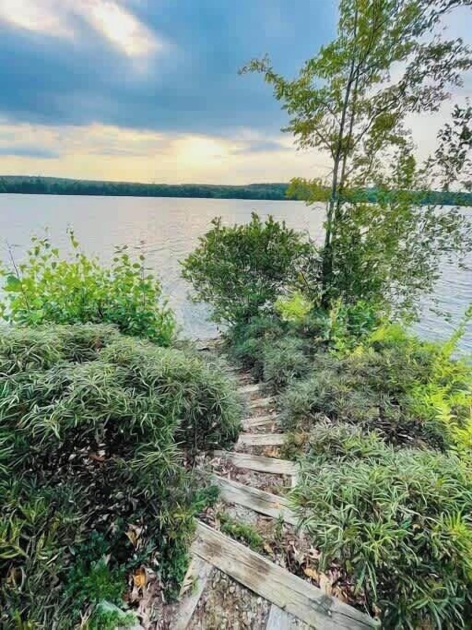 Steps to the private and shared beaches.  August–September water temps stay in the 70s.