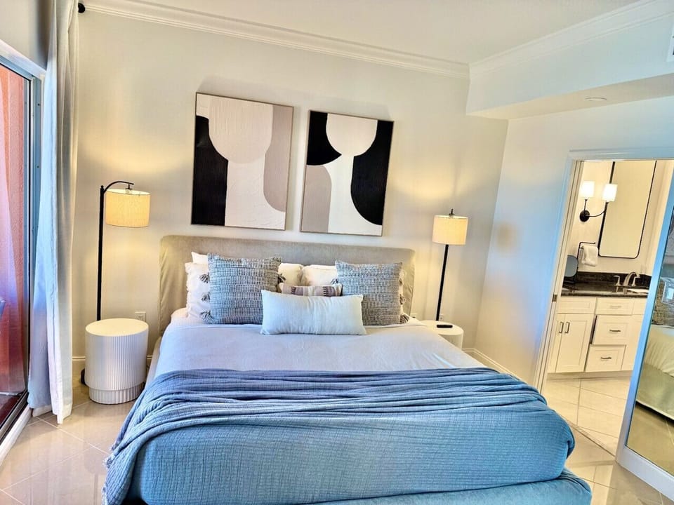 Master bedroom, king bed with walk in closet and patio access.