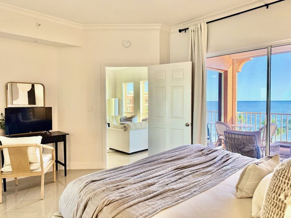 Master bedroom, king bed with walk in closet and patio access.