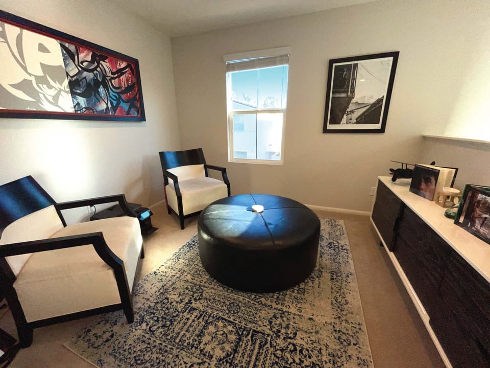 Loft at top of stairs, outside of primary bedroom