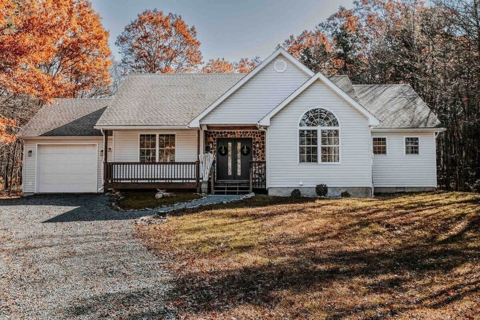 Charming Home Exterior with Private Driveway