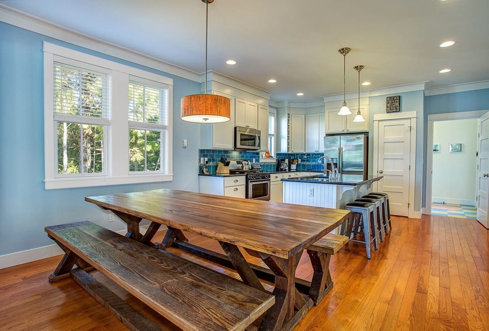 The dining table greets as many as 10 guests
