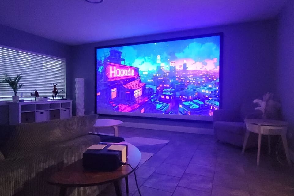 Lounge in front of the massive proj screen for a cozy movie night
