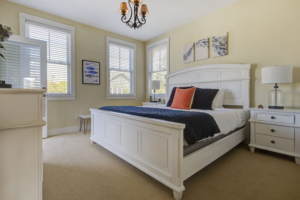 The spacious primary bedroom offers comfort, style and relaxation