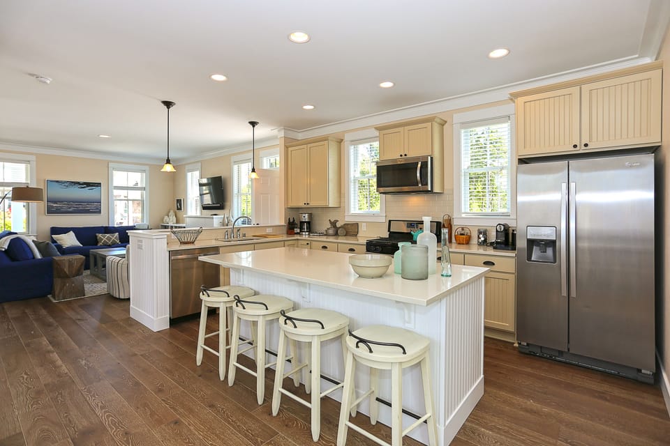 Open concept kitchen, dining, and living room