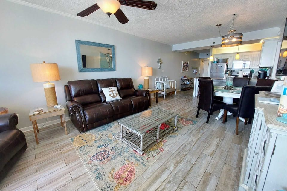 Tiled living room with comfy seating.