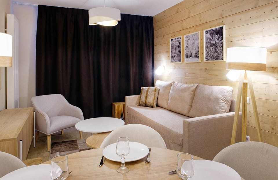 Sink into the cozy sofa after a day exploring the area.