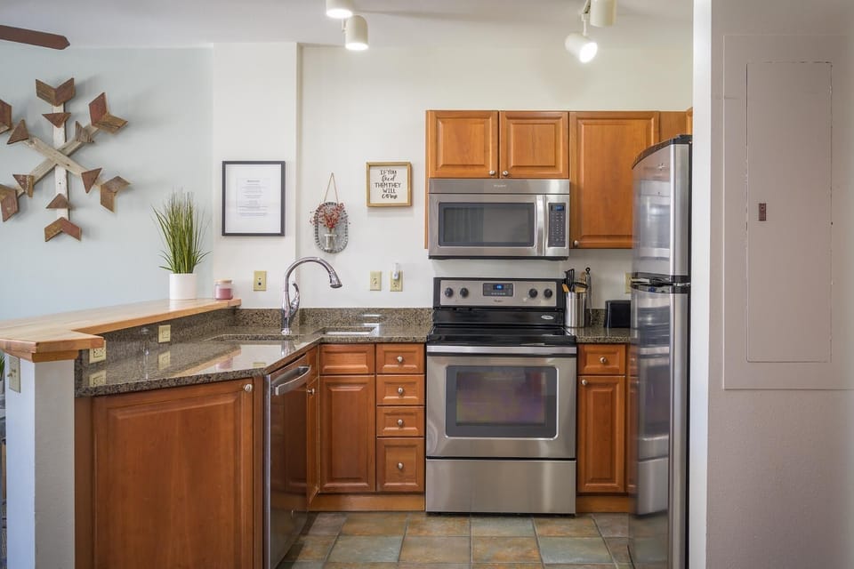Full size kitchen in the condo