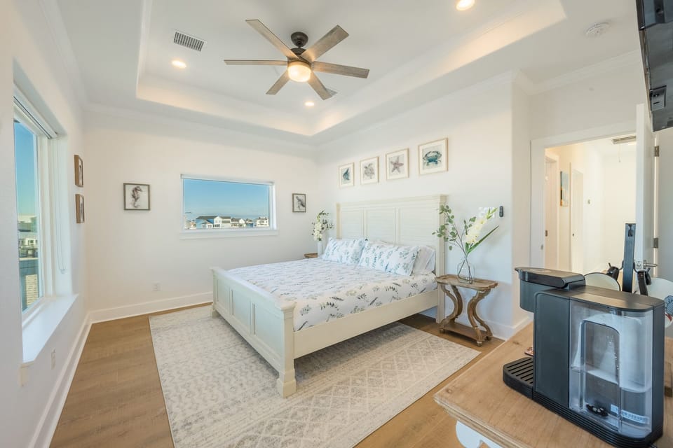 Master with private deck and 180 degree canal views w/personal coffee bar and TV