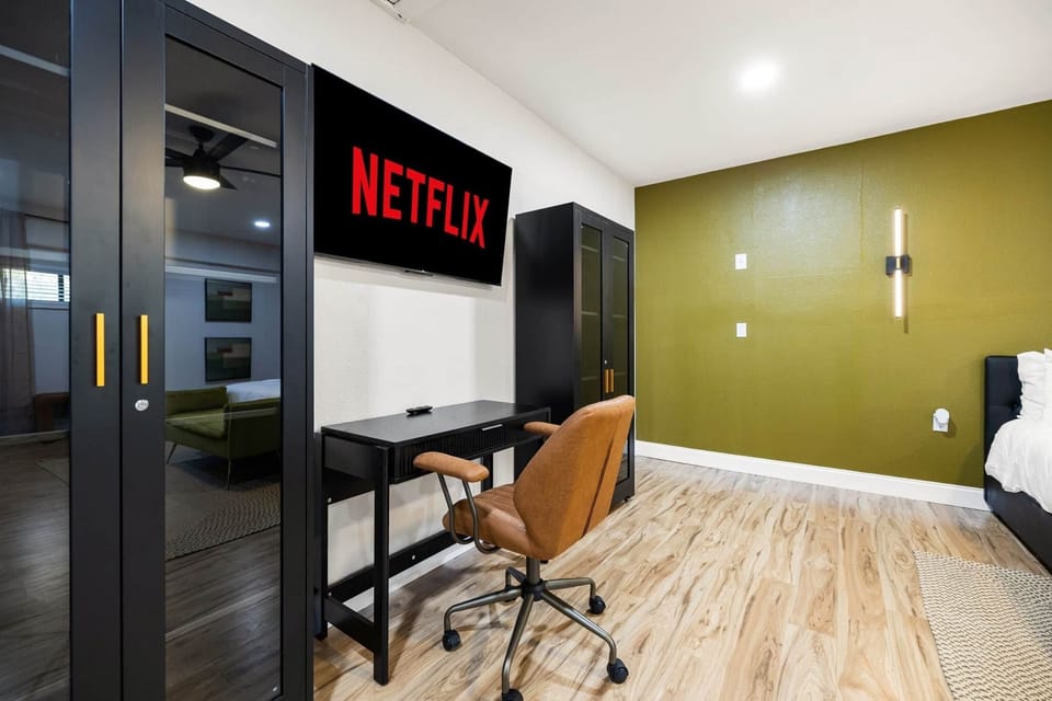 Workspace and Television in Primary Bedroom