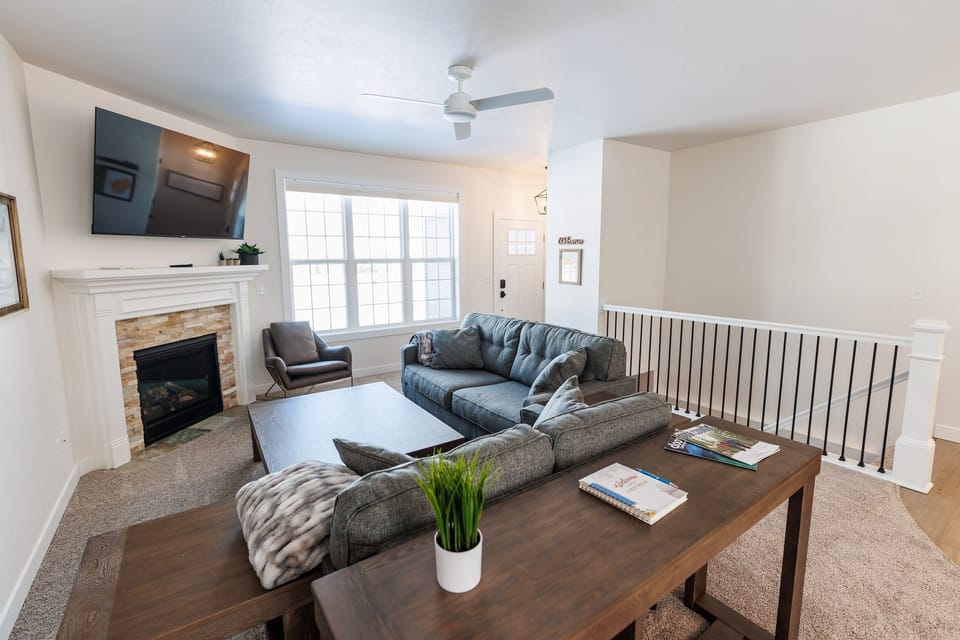 Open staircase leads to beautiful lower level