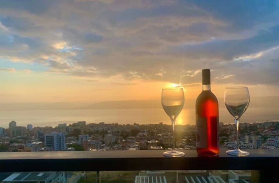 Chill on the balcony with a  glass of wine 