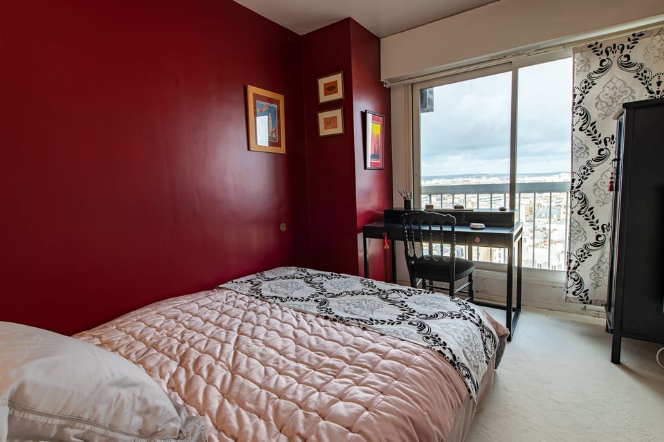 Bedroom1 - Offers a double bed with a desk, chair and an armoire