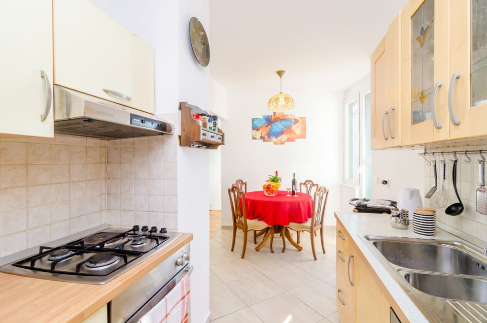 Apartment, Sea View | Private kitchen | Fridge, microwave, oven, stovetop
