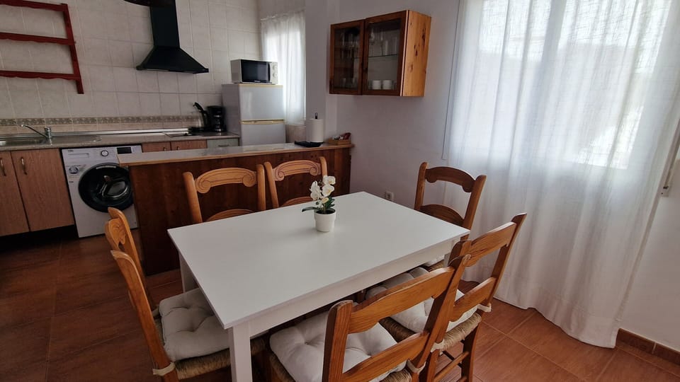 Basic Apartment, Pool View | Living area | 32-inch Smart TV with cable channels, TV
