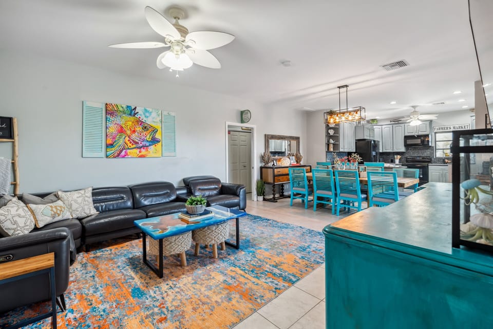 Comfortable seating and open sightlines make this the perfect gathering spot for family and friends.