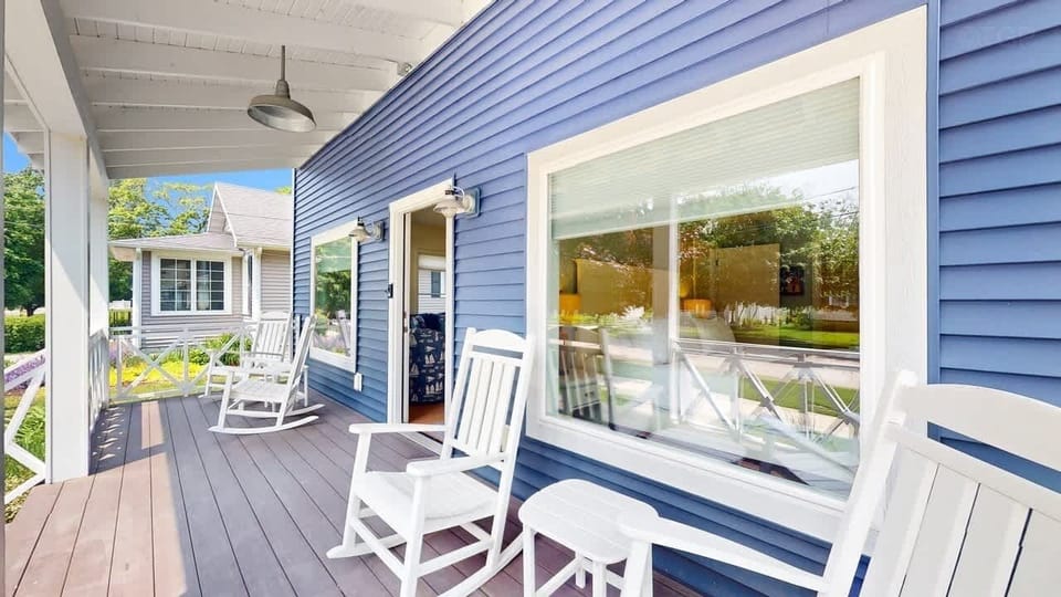 Enter the home through the cute front porch 
