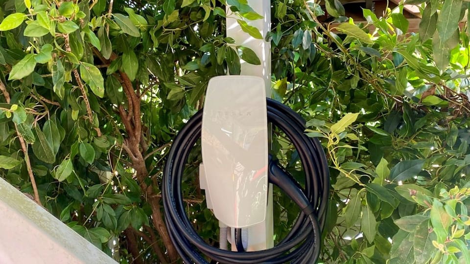 Tesla Charger  located in the car port 