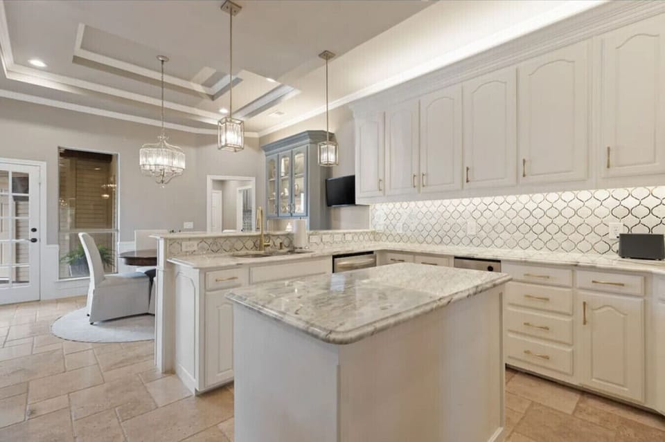 The kitchen has an island with all the cooking utensils you will need