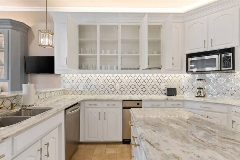 Our kitchen is the heart of our home and the perfect spot for whipping up a delicious meal. The space is fully equipped with modern appliances. The ample counter space and well-stocked cabinets provide plenty of room for your meal prep.