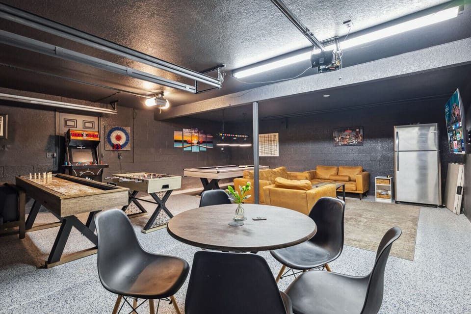 relax in this stylish game room with plenty of seating.