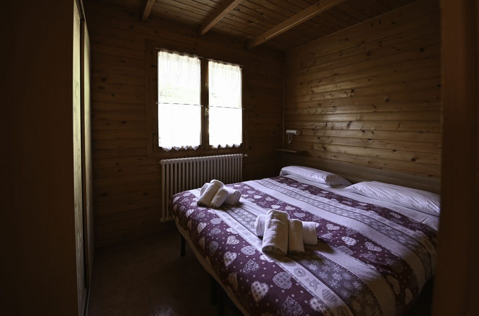 Comfort Chalet, 2 Bedrooms, Mountain View | 2 bedrooms, down comforters, travel crib, free WiFi