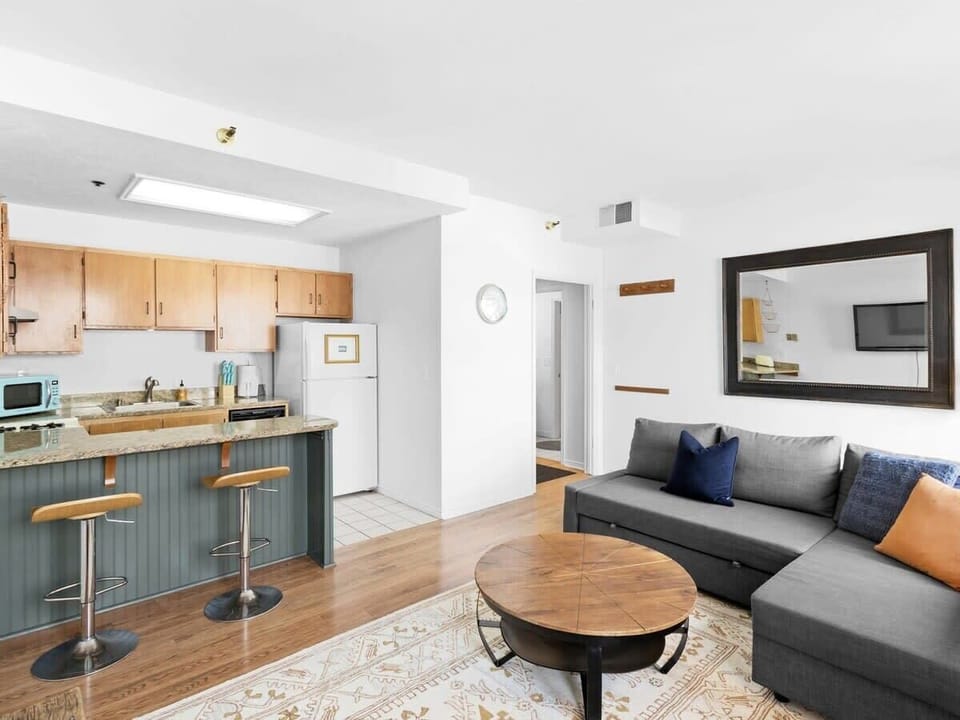 The open shared living area is the perfect space to unwind after a full day of exploring.