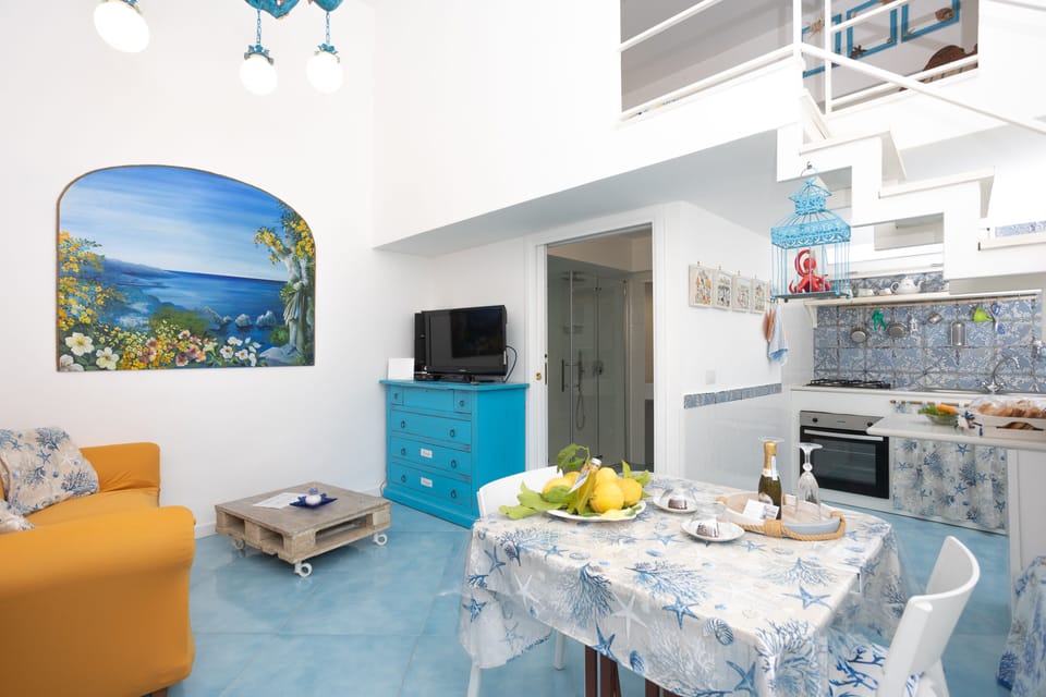 Deluxe Room, 1 Bedroom, Non Smoking | Living area | 20-inch Smart TV with satellite channels, TV