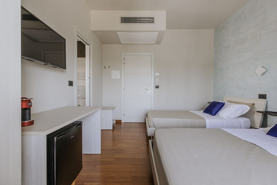 Triple Room | Premium bedding, down comforters, memory foam beds
