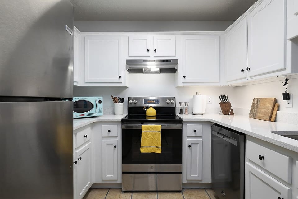 Our fully stocked kitchen perfect for preparing home cooked meals for your friends and families.