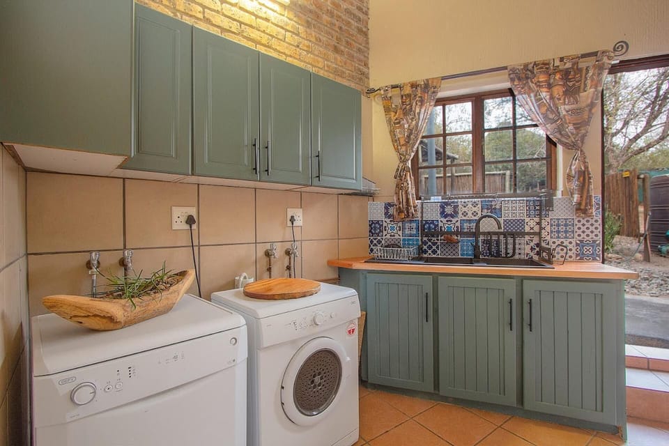 Villa | Private kitchen | Fridge, microwave, oven, stovetop