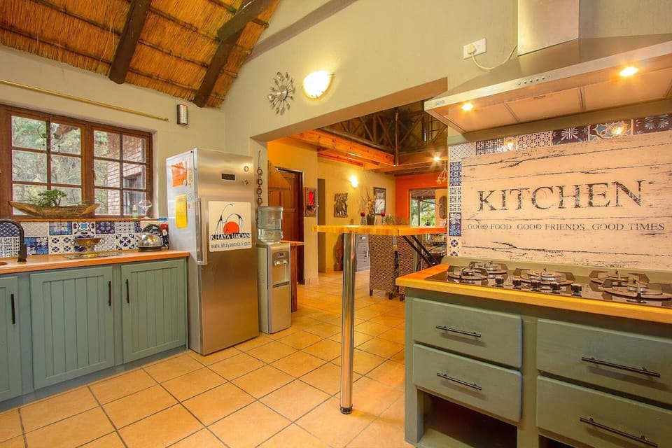 Villa | Private kitchen | Fridge, microwave, oven, stovetop