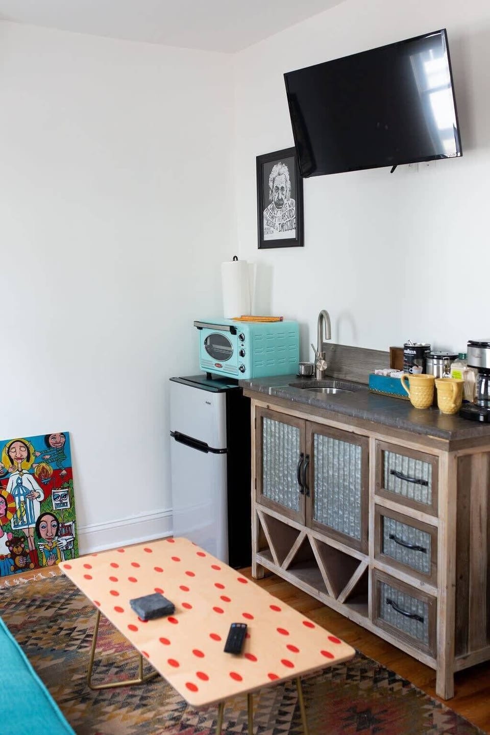Kitchenette with tea and coffee provided. Britta water pitcher, plates, glasses, mugs, and utensils