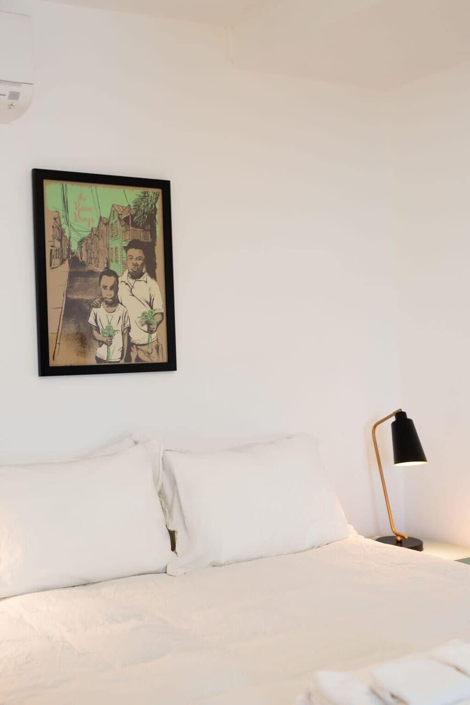 Bedroom with print by local artist, Dos Bandidos
