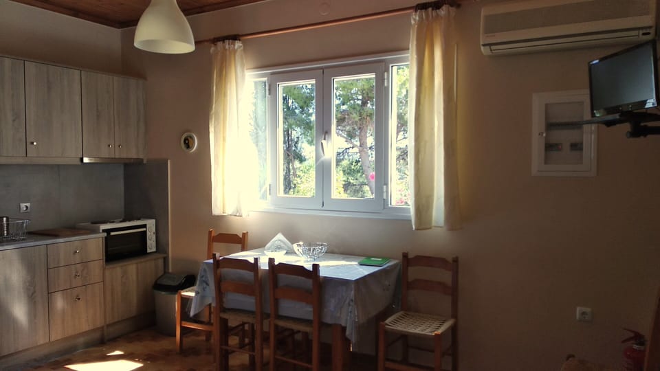 Christina Villa - Kitchen fully equipped with Living Room and dining area