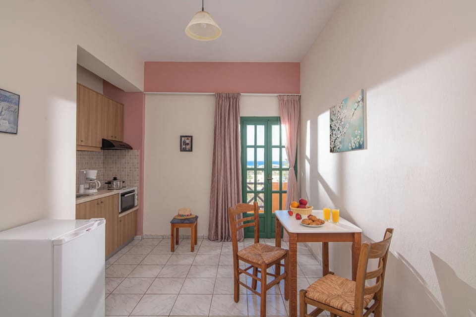 Superior One Bedroom Apartment with Sea View | Private kitchenette | Fridge, stovetop, coffee/tea maker, electric kettle