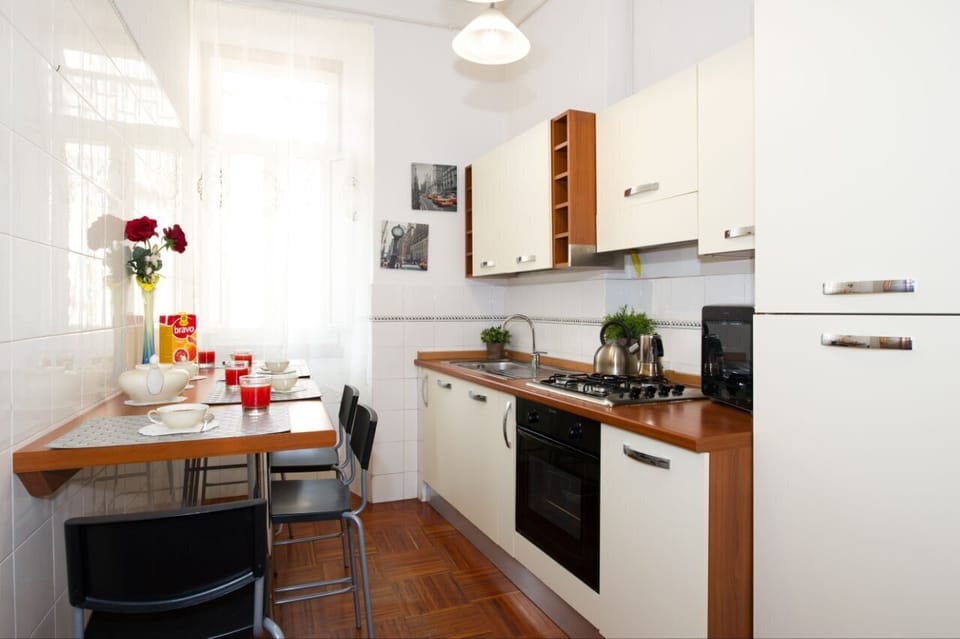 Family Apartment | Private kitchen | Espresso maker, coffee/tea maker, full-size fridge, microwave