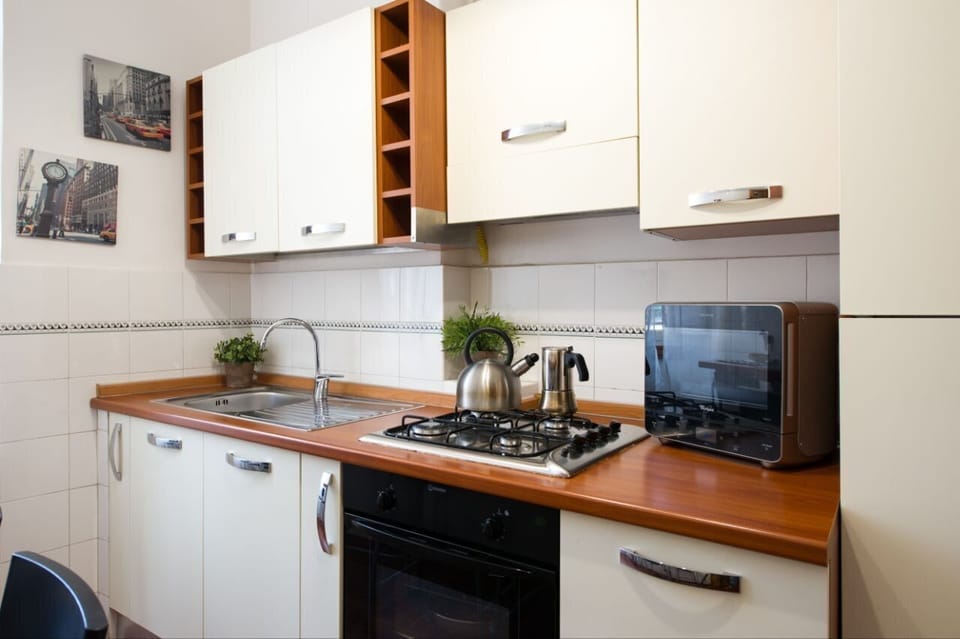 Family Apartment | Private kitchen | Espresso maker, coffee/tea maker, full-size fridge, microwave