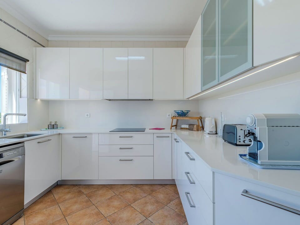 Cabinetry, Kitchen, Countertop, Kitchen Appliance, Flooring, Interior Design, Wood, Major Appliance, Floor, Furniture