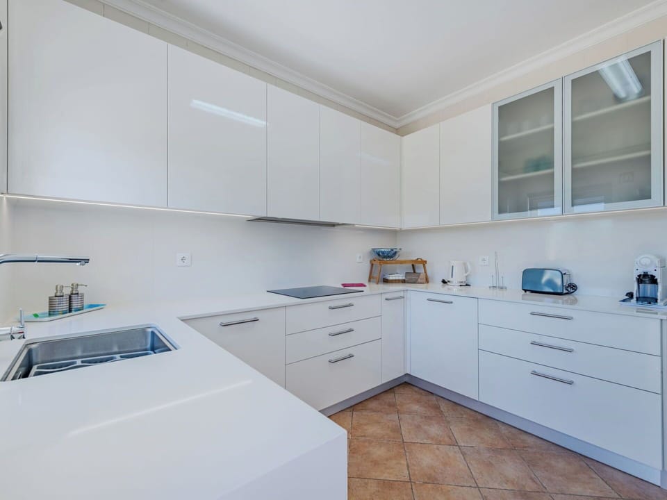 Cabinetry, Kitchen, Countertop, Flooring, Kitchen Appliance, Interior Design, Wood, Floor, Drawer, Cupboard