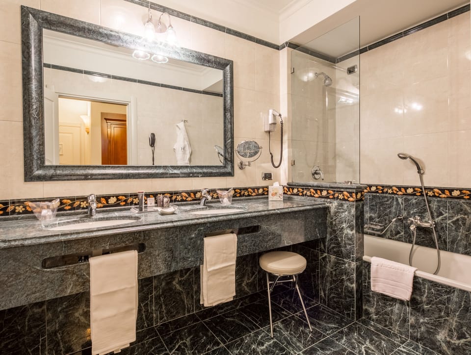 Eco-friendly toiletries, hair dryer, bathrobes, towels