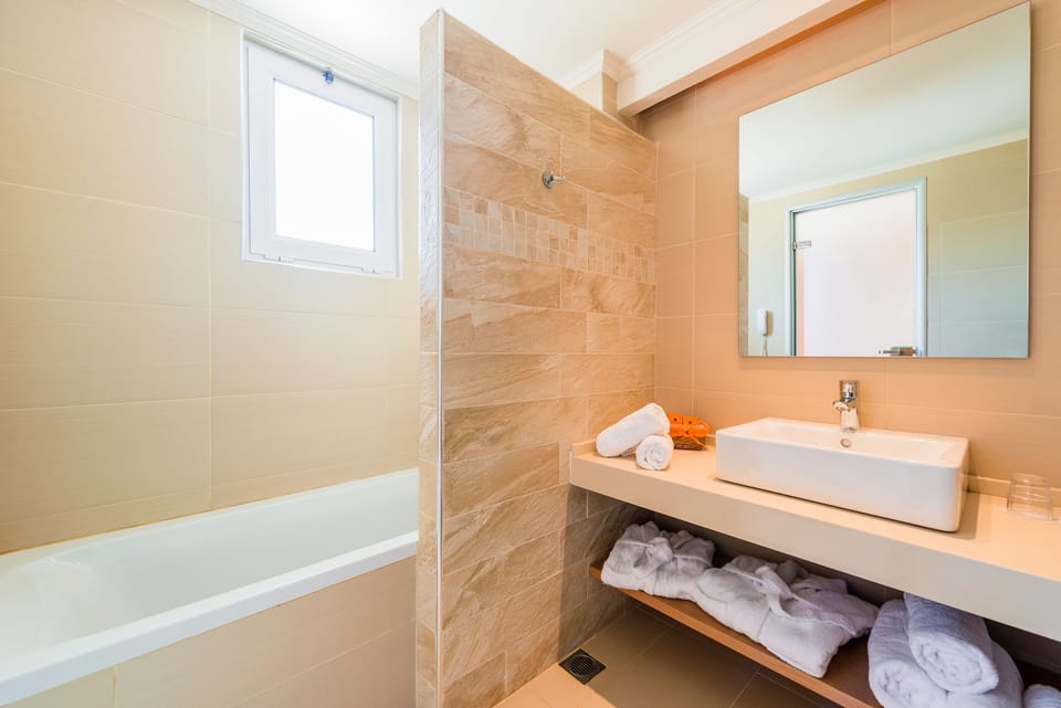 In-room safe, laptop workspace, blackout drapes, soundproofing