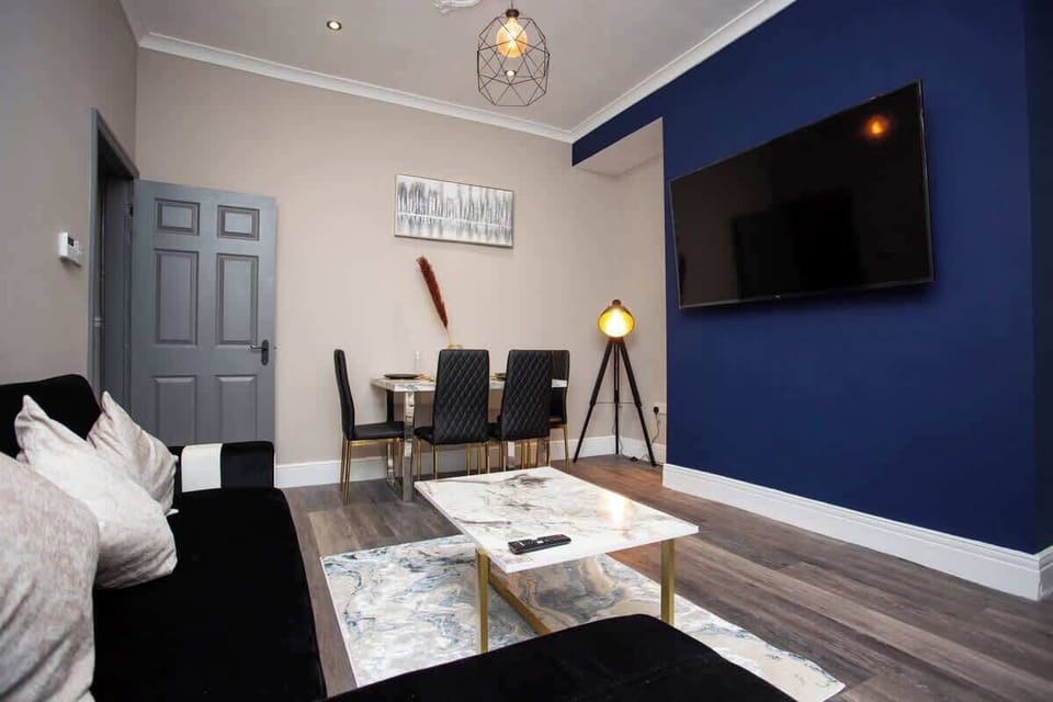 Dominated by a generously sized TV, sink into the plush depths of our sofa as you catch up on your favorite shows or enjoy a movie night with loved ones. . 
