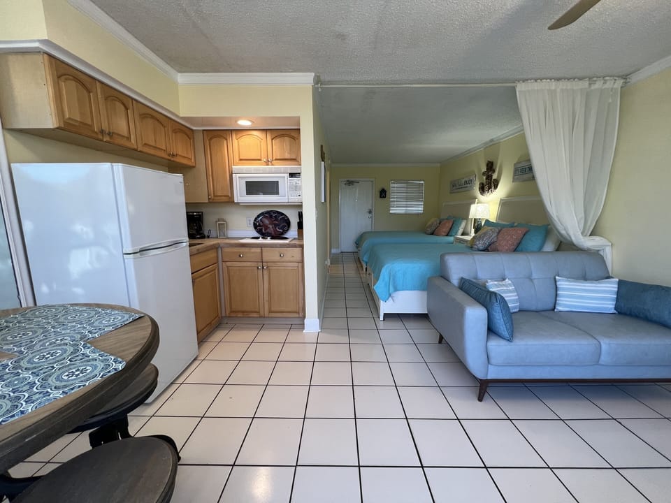 View of the kitchen, dining space, and sitting area plus into th - View of the kitchen, dining space, and sitting area plus into the sleeping area.