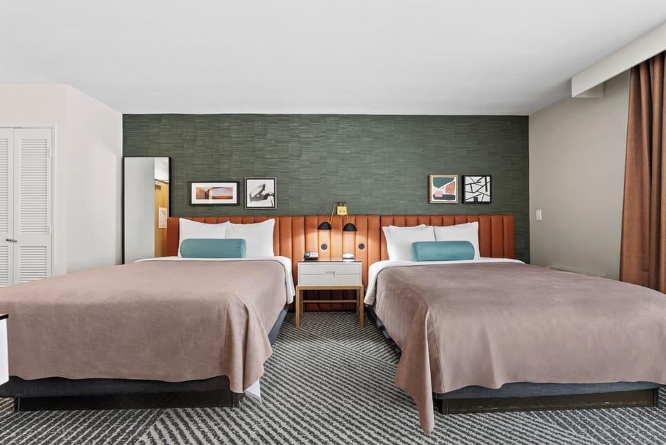 Pillowtop beds, in-room safe, laptop workspace, blackout drapes