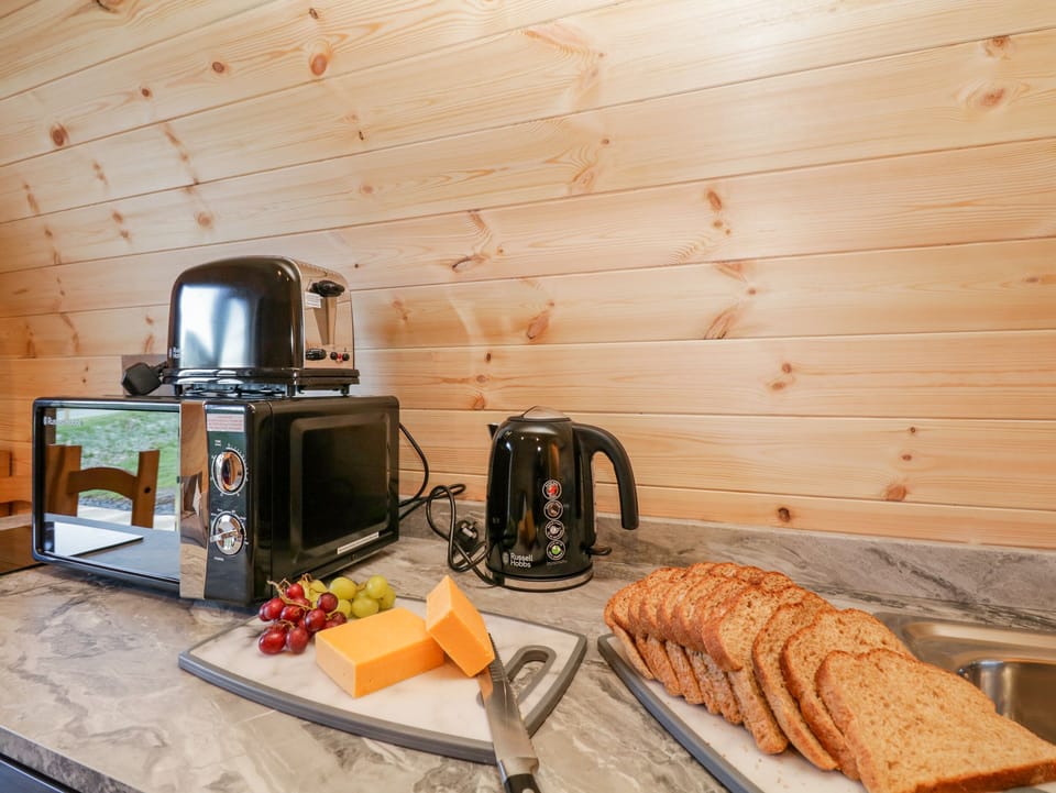 Fridge, electric kettle, toaster, cookware/dishes/utensils