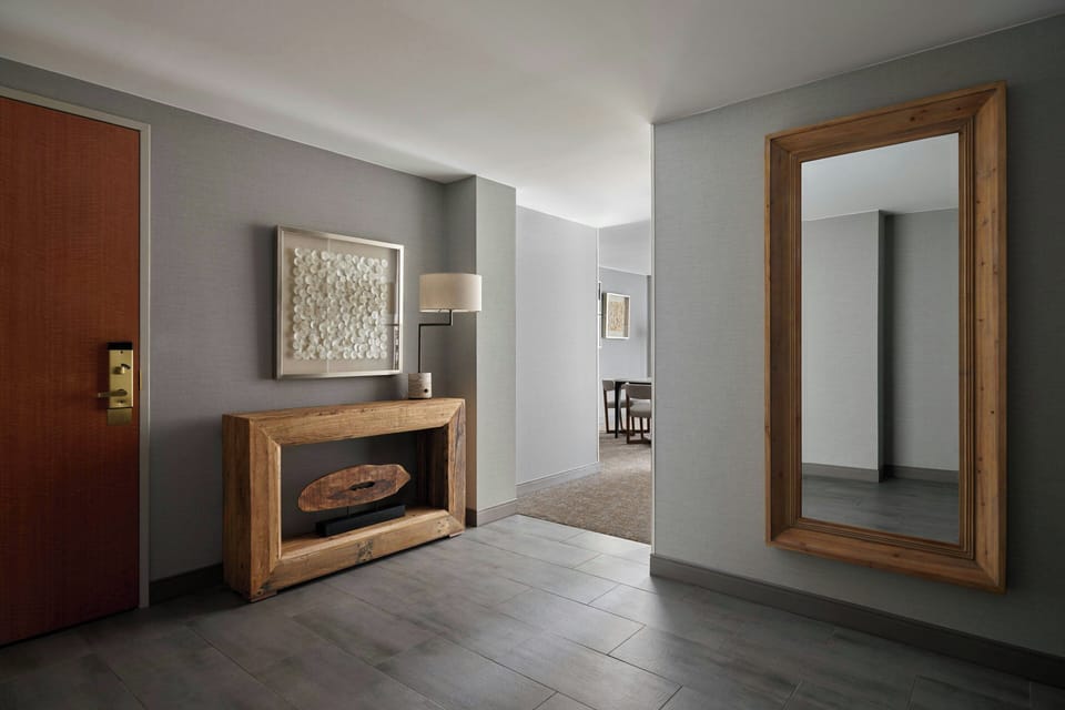 Premium bedding, desk, laptop workspace, blackout drapes