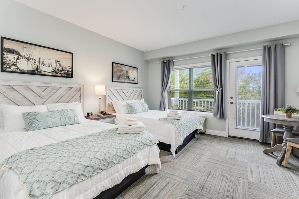 Double queen bed with blackout curtains